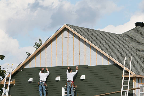 Professional Siding Installation technician working in Greenville, IL